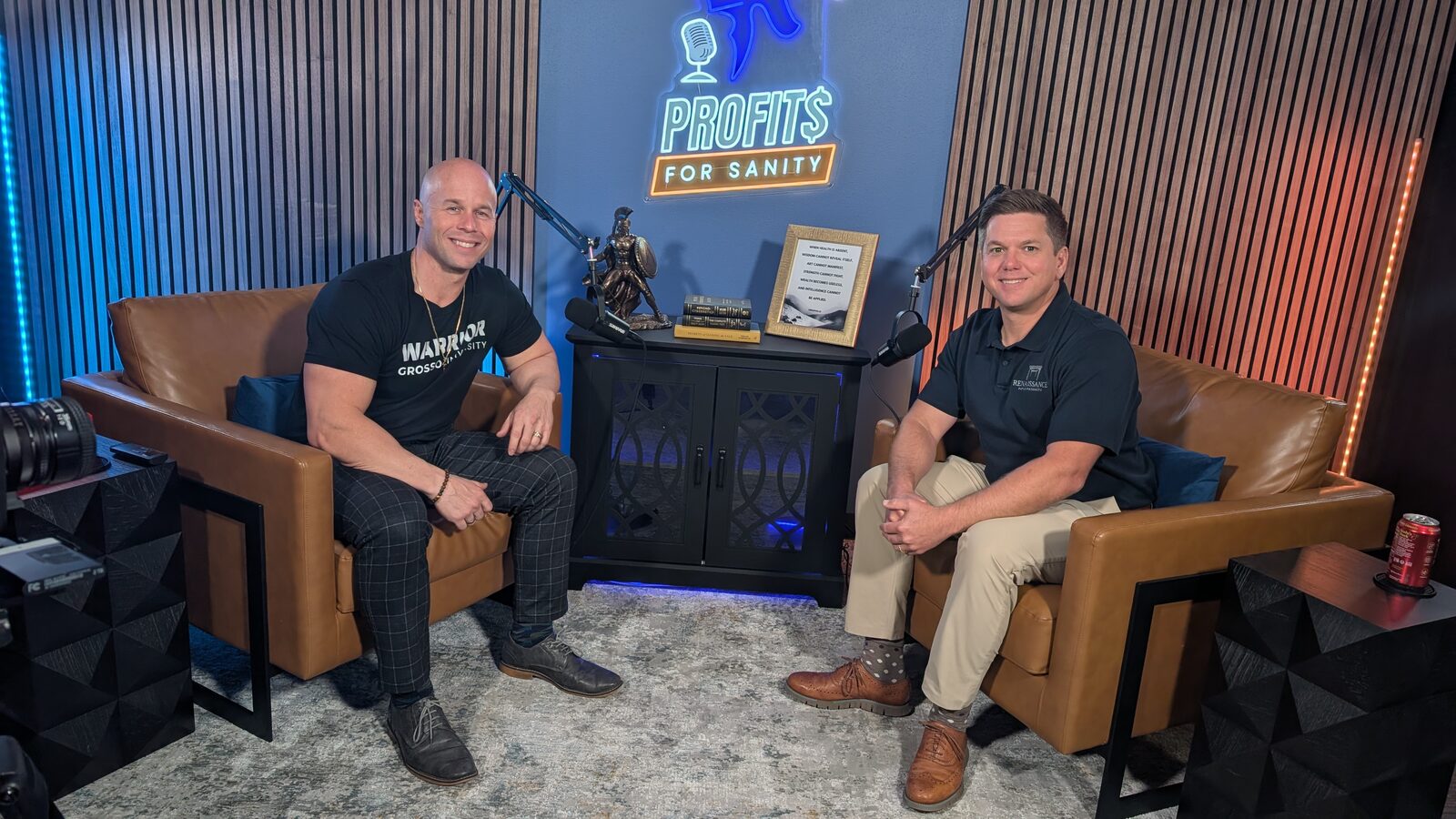 Dominic Caminata and a guest seated in the two armchairs of the Profits for Sanity podcast set, ready to record.